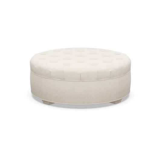 Paul Robert 54 Wide Tufted Round Cocktail Ottoman With Tapered Foot