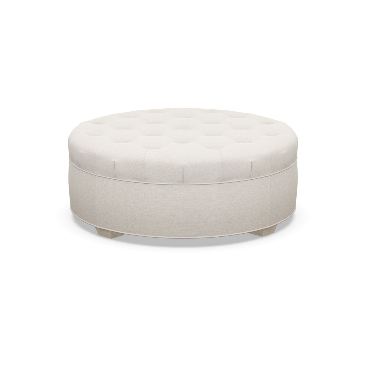 Paul Robert 54 Wide Tufted Round Cocktail Ottoman With Tapered Foot