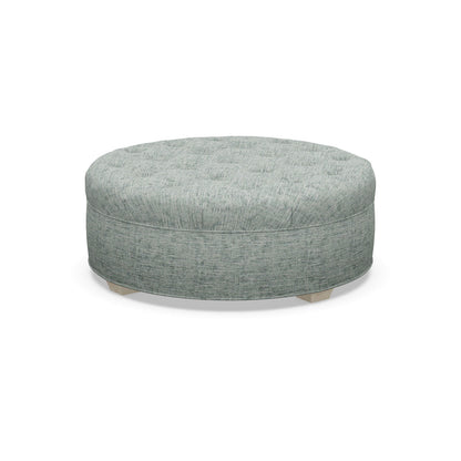 Paul Robert 54 Wide Tufted Round Cocktail Ottoman With Tapered Foot