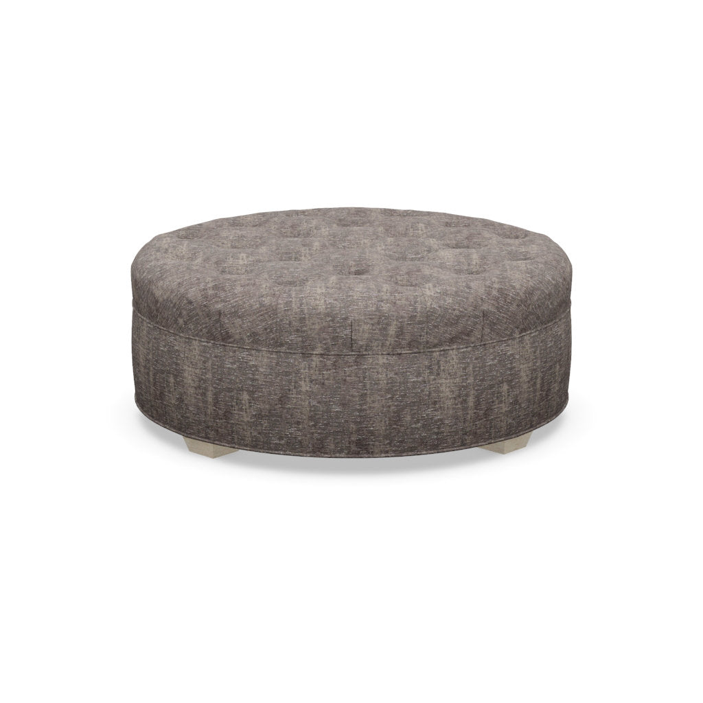 Paul Robert 54 Wide Tufted Round Cocktail Ottoman With Tapered Foot