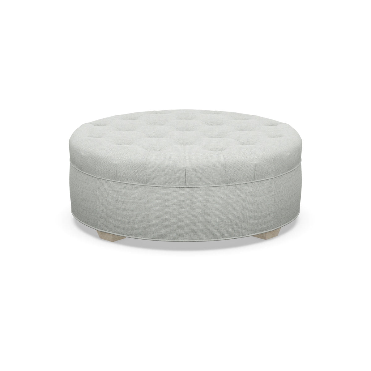 Paul Robert 54 Wide Tufted Round Cocktail Ottoman With Tapered Foot