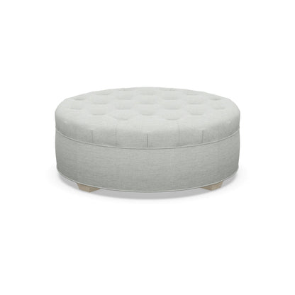 Paul Robert 54 Wide Tufted Round Cocktail Ottoman With Tapered Foot