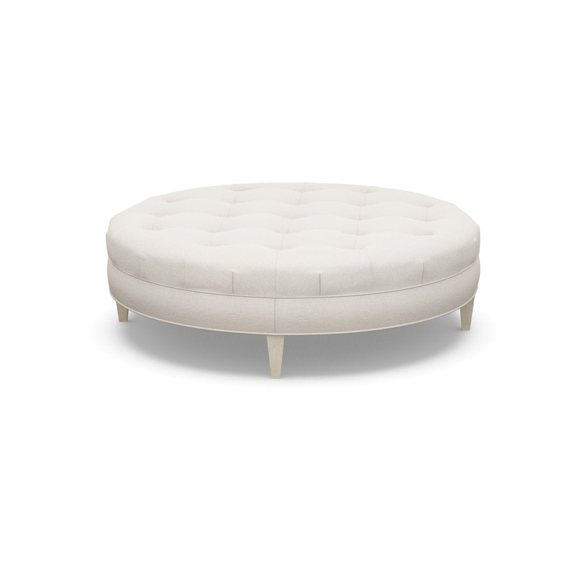 Paul Robert 60 Wide Tufted Round Cocktail Ottoman With Tapered Leg
